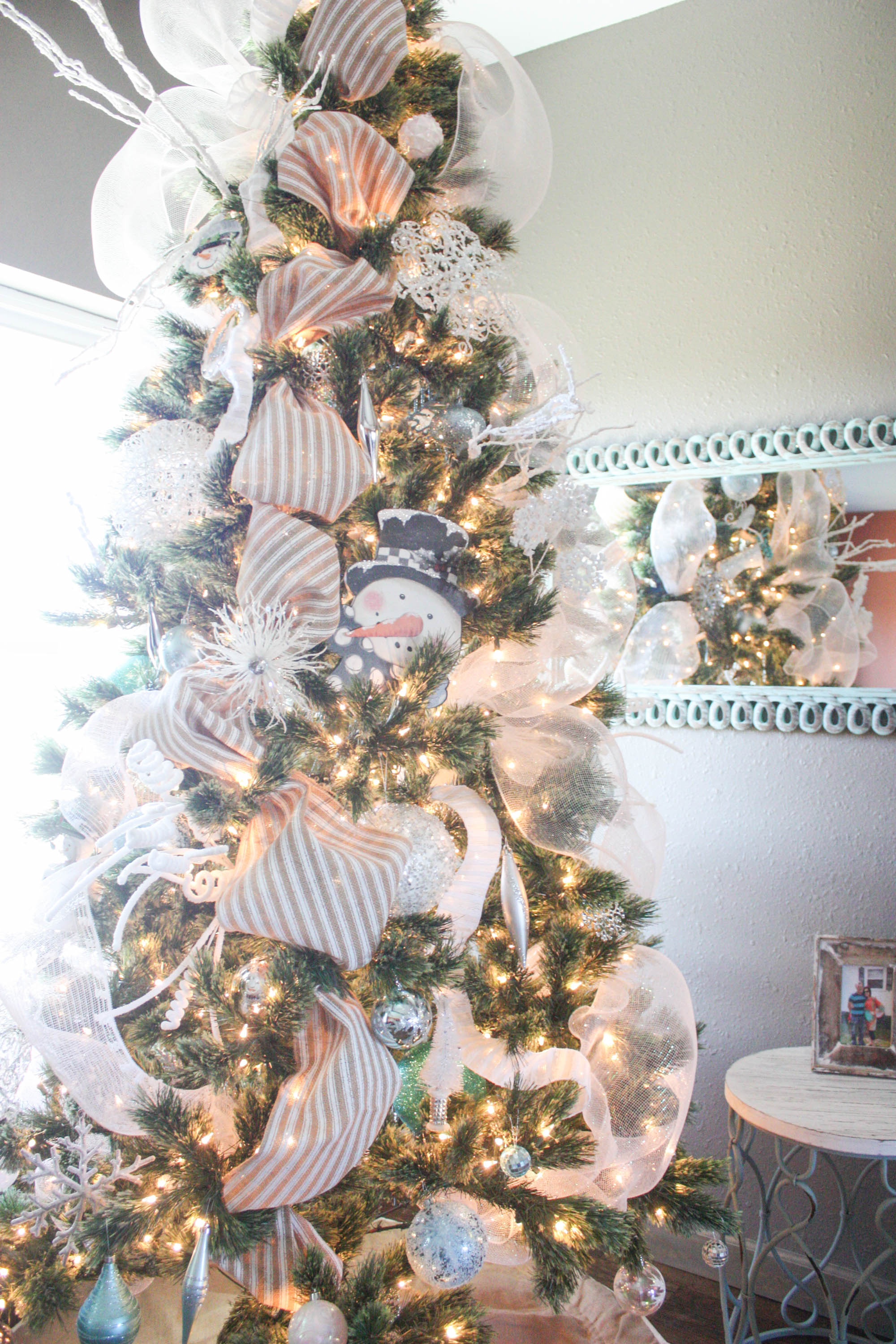 christmas trees decorated with mesh ribbon