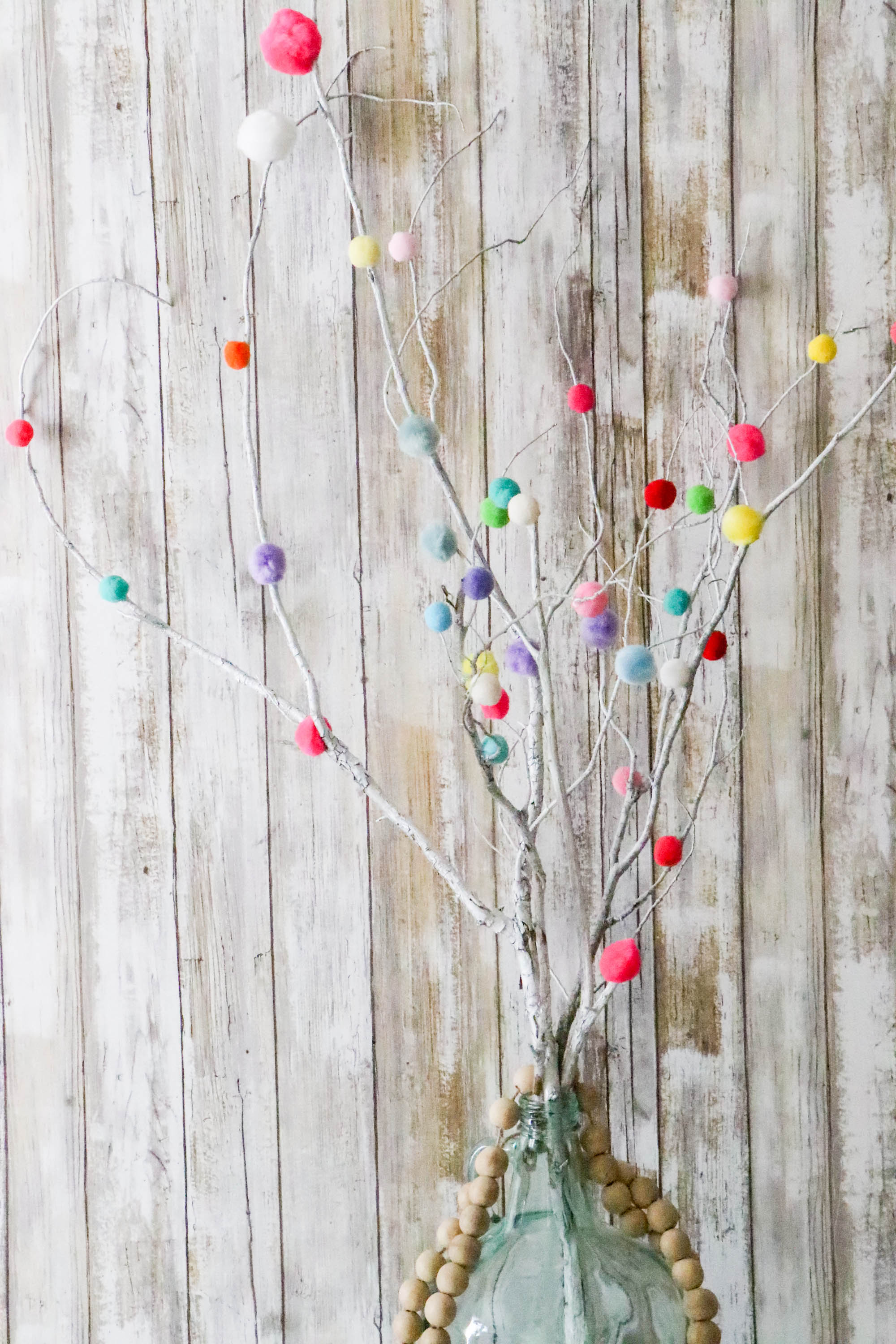 DIY Colorful Pom Pom Sticks - Re-Fabbed