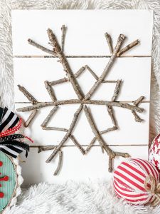 diy stick snowflake sign