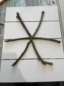 start forming your sticks into a snowflake