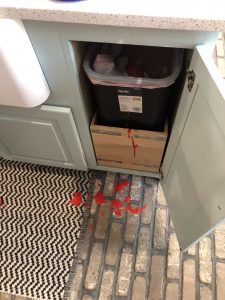 red paint on old mill brick flooring