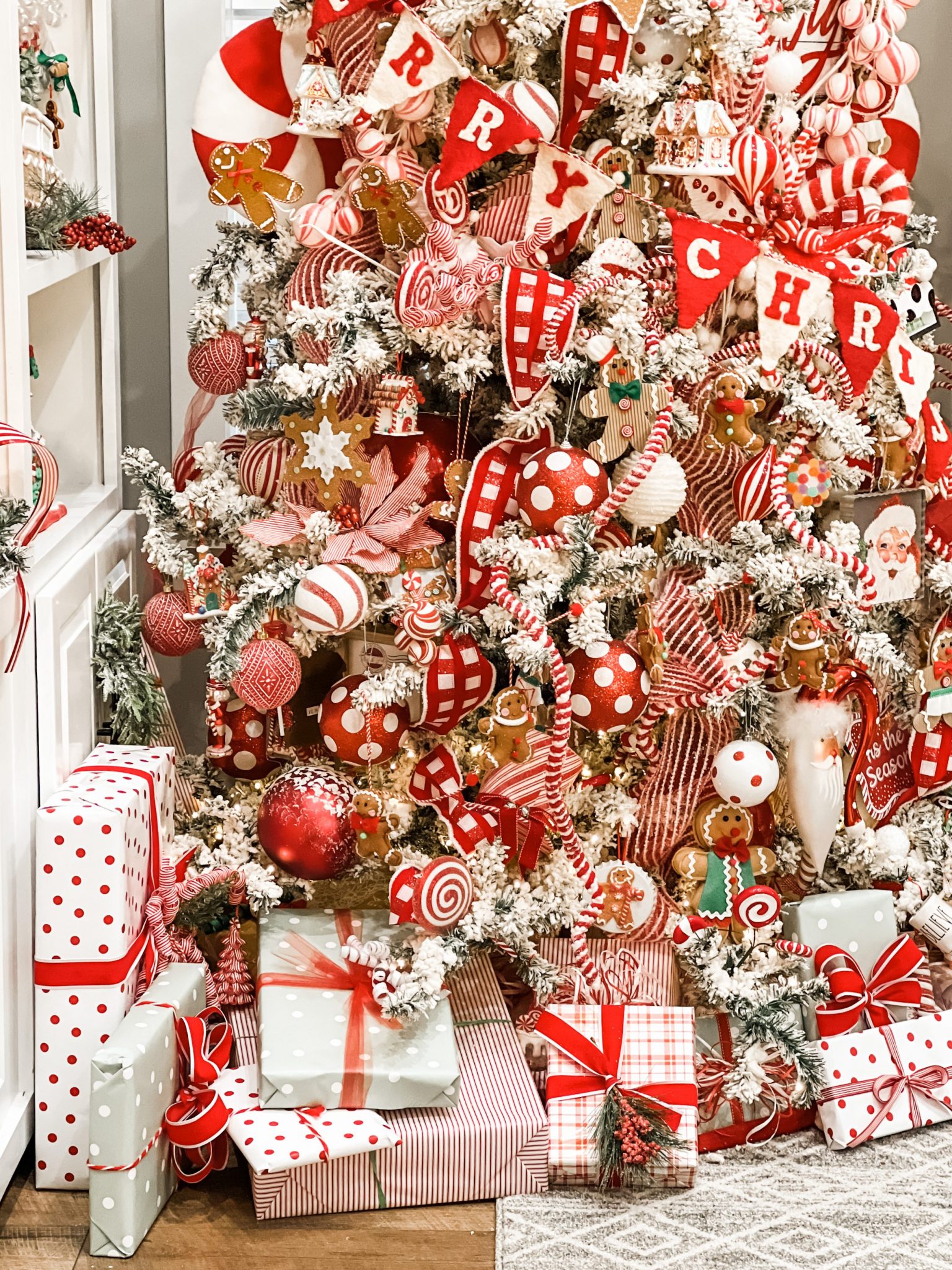 red and white christmas tree with gingerbread