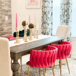 dining room with pink chairs